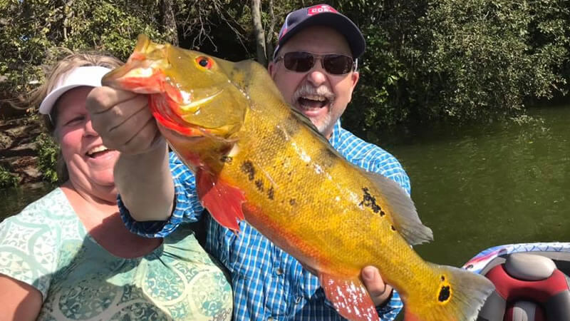 Lake Ida - Complete Guide to Lake Ida Fl 15 Man with peacock bass in South Florida